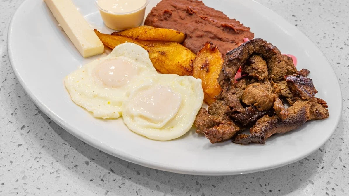 Pollo Catracho - Honduran-style seasoned chicken, a house specialty